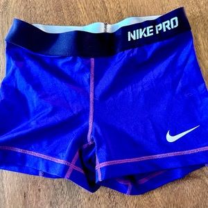 Women’s short purple Nike pros